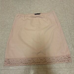 Body Slimmers by Nancy Ganz nude pink lace trim body shaper skirt.